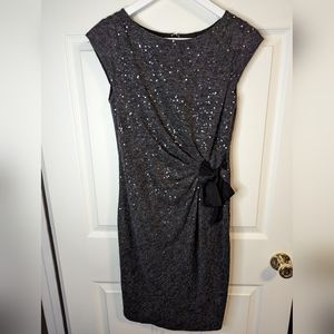 The limited dark grey dress with sequins and side tie size XSmall